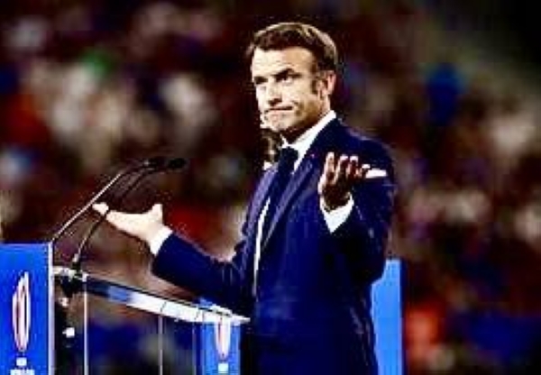 French President Emmanuel Macron delivers a speech during the opening ceremony of the France 2023 Rugby World Cup ahead of the Pool A match between France and New Zealand at the Stade de France in Saint-Denis, on the outskirts of Paris on September 8, 2023. (Photo by Anne-Christine POUJOULAT / AFP)