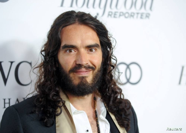 British actor and comedian Russell Brand arrives at the 2nd Annual Reel Stories, Real Lives event benefiting the Motion Picture & Television Fund in Los Angeles, California October 20, 2012. REUTERS/Gus Ruelas (UNITED STATES - Tags: ENTERTAINMENT)