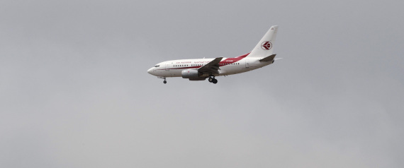 An Air Algerie Airways plane prepares to land at Houari Boumediene Airport in Algiers