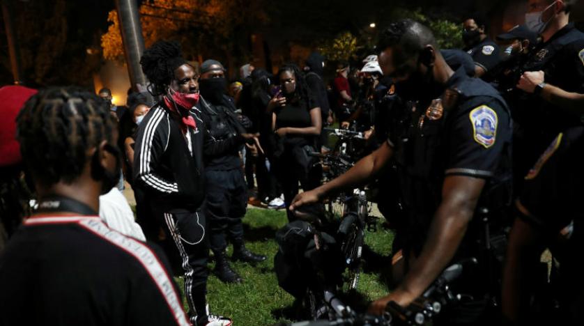 2020-09-03T040147Z_634163431_RC2SQI95714S_RTRMADP_3_GLOBAL-RACE-PROTESTS-WASHINGTON