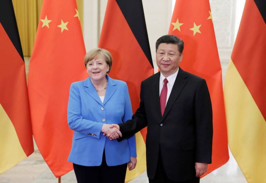 China's President Xi Jinping meets German Chancellor Angela Merkel at the Great Hall of the People in Beijing